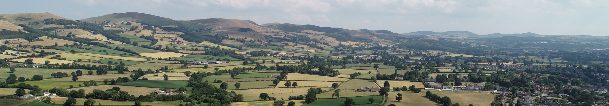 Aerial video of North Wales countryside and farm land